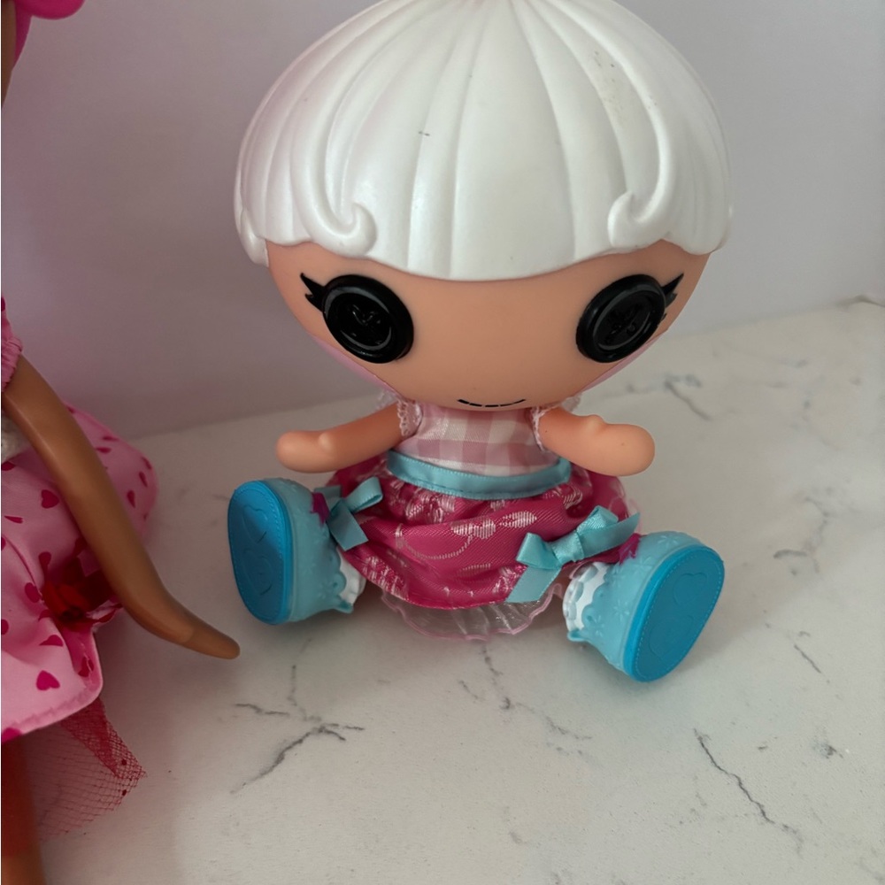 Charming Pink and Blue Collectible Dolls